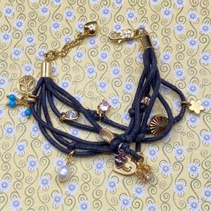 JUICY COUTURE Gold Tone Charms Black Cording Bracelet